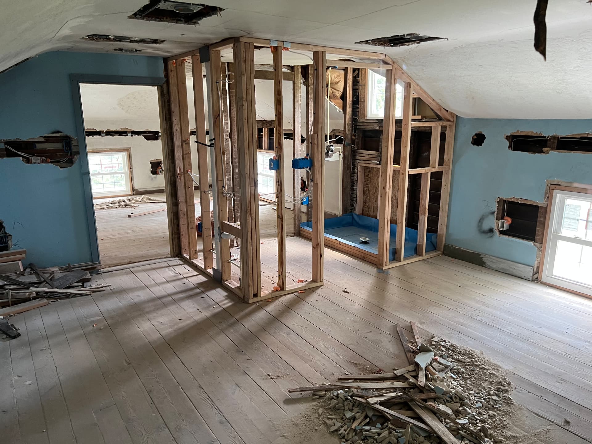 Upstairs rooms stripped and reframed for a new bathroom and shower pan