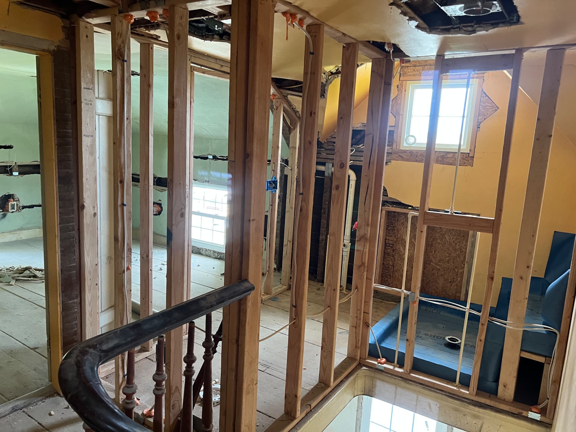 New walls framed around the stairs for an upstairs bathroom and shower