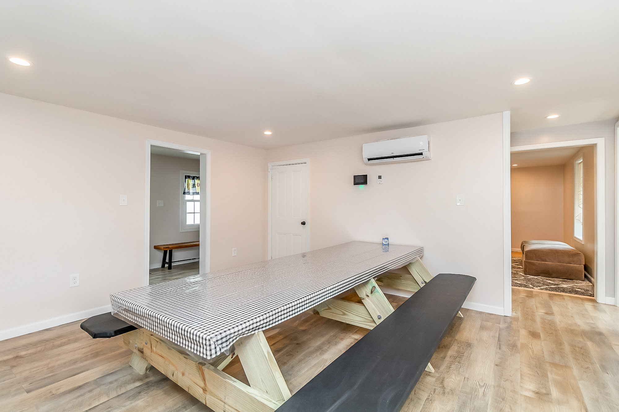 Long farmhouse table with bench seating for big family meals