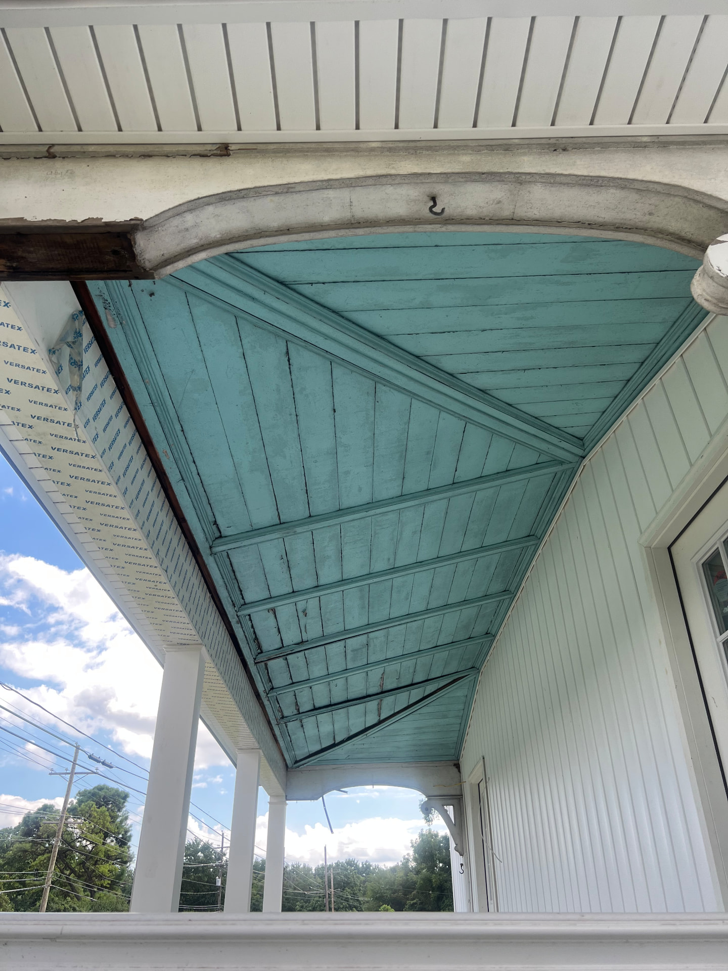 The original robin's-egg blue beadboard porch ceiling, cleaned and kept